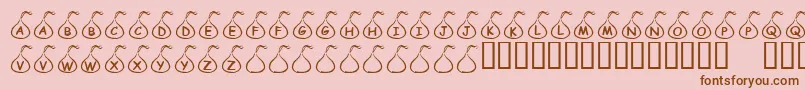 フォントKrCandyKiss – ピンクの背景に茶色のフォント