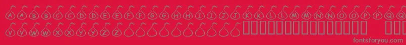 KrCandyKiss-fontti – harmaat kirjasimet punaisella taustalla