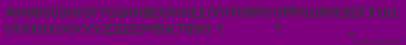 Hexagonal-fontti – mustat fontit violetilla taustalla