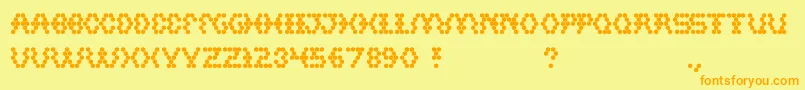 フォントHexagonal – オレンジの文字が黄色の背景にあります。