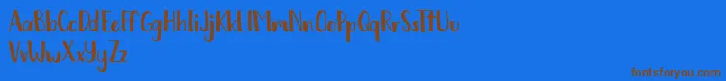 Chickadee free Font – Brown Fonts on Blue Background