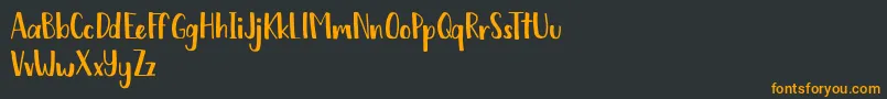 Chickadee free Font – Orange Fonts on Black Background
