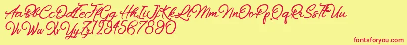 Chiennes Stimulantes-Schriftart – Rote Schriften auf gelbem Hintergrund