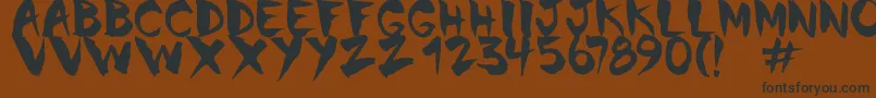 Chinela Brush Font – Black Fonts on Brown Background