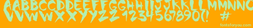 Chinela Brush Font – Green Fonts on Orange Background