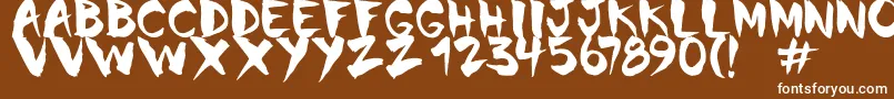 Chinela Brush-fontti – valkoiset fontit ruskealla taustalla