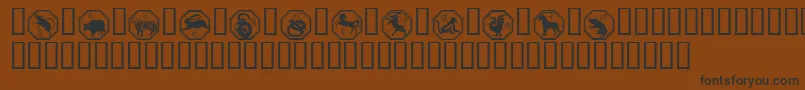 fuente Chinese Zodiac – Fuentes Negras Sobre Fondo Marrón