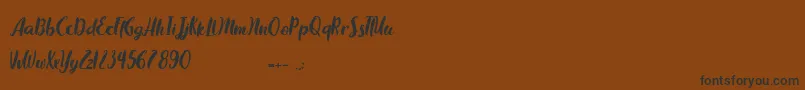 Chocolate Flavor-Schriftart – Schwarze Schriften auf braunem Hintergrund