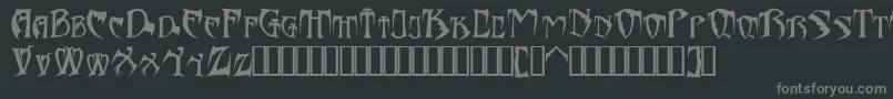 フォントBats26dragonsAbaddon – 黒い背景に灰色の文字