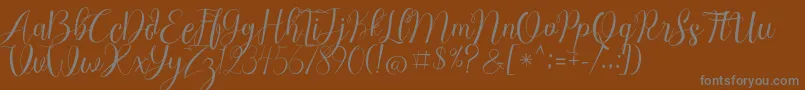 Chocolate Milky Free Personal Font – Gray Fonts on Brown Background