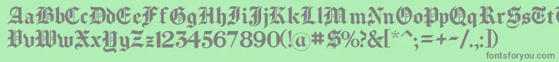 フォントChomsky – 緑の背景に灰色の文字