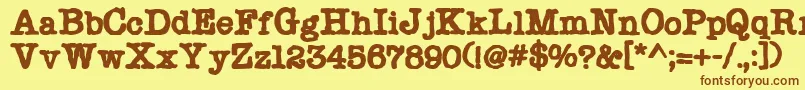 フォントChonker – 茶色の文字が黄色の背景にあります。
