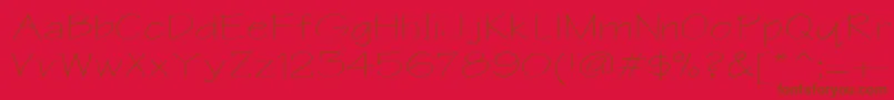 Writeextended-fontti – ruskeat fontit punaisella taustalla