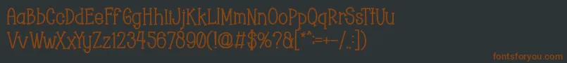 フォントChopyor Bold – 黒い背景に茶色のフォント