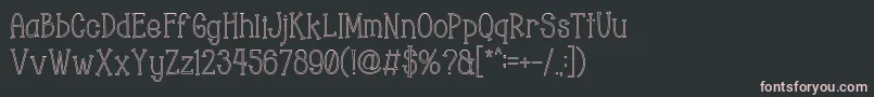 フォントChopyor Hollow – 黒い背景にピンクのフォント