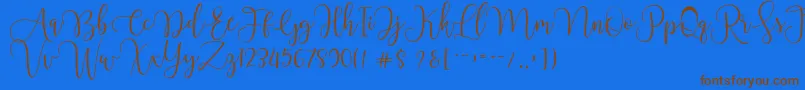 Czcionka Chourush – brązowe czcionki na niebieskim tle