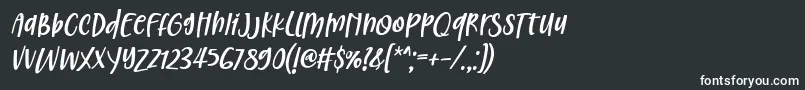 フォントChristed Font by 7NTypes Italic – 黒い背景に白い文字