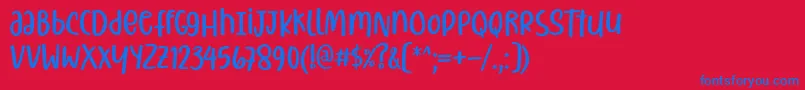 Christiany Font by 7NTypes-Schriftart – Blaue Schriften auf rotem Hintergrund