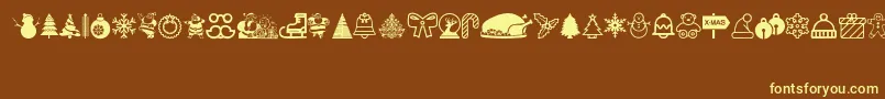 Christmas Icons-fontti – keltaiset fontit ruskealla taustalla