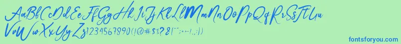 Christmas-Schriftart – Blaue Schriften auf grünem Hintergrund