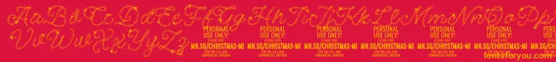 フォントChristmasMiracle PERSONAL – 赤い背景にオレンジの文字