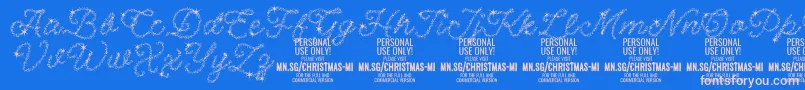 ChristmasMiracle PERSONAL-fontti – vaaleanpunaiset fontit sinisellä taustalla