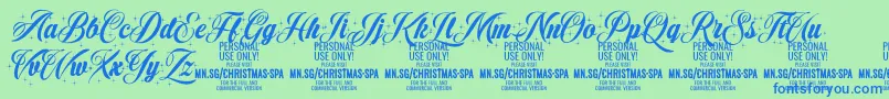 Шрифт ChristmasSparkle PERSONAL – синие шрифты на зелёном фоне