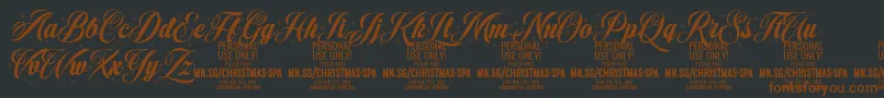 Шрифт ChristmasSparkle PERSONAL – коричневые шрифты на чёрном фоне