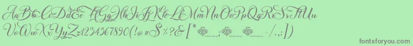 ChristmasWish Calligraphy Font – Gray Fonts on Green Background