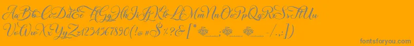 Fonte ChristmasWish Calligraphy – fontes cinzas em um fundo laranja