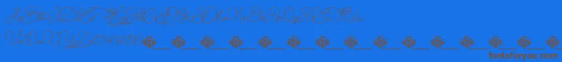 ChristmasWish monoline-Schriftart – Braune Schriften auf blauem Hintergrund