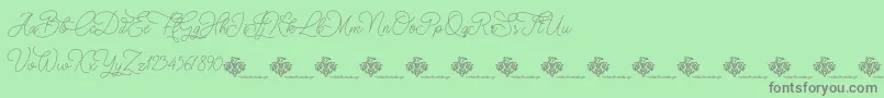 ChristmasWish monoline Font – Gray Fonts on Green Background