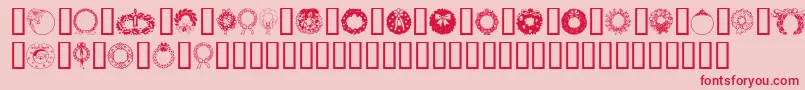 フォントChristmasWreath – ピンクの背景に赤い文字