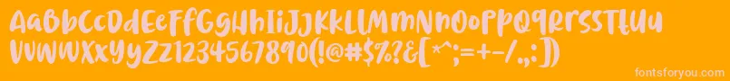 フォントChrisye Font by 7NTypes – オレンジの背景にピンクのフォント