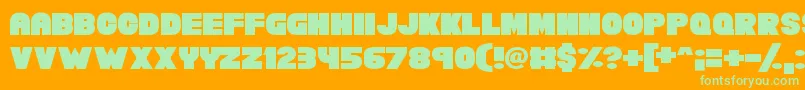 Chunky Funks-Schriftart – Grüne Schriften auf orangefarbenem Hintergrund