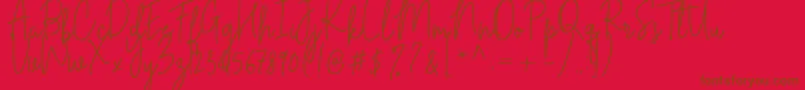 フォントCilupba – 赤い背景に茶色の文字