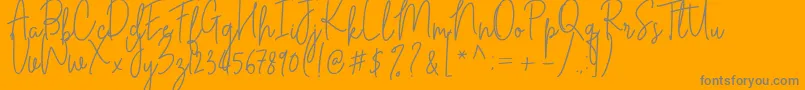 Cilupba-Schriftart – Graue Schriften auf orangefarbenem Hintergrund