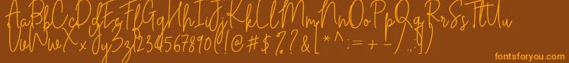 Cilupba Font – Orange Fonts on Brown Background