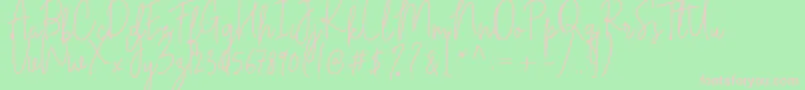 フォントCilupba – 緑の背景にピンクのフォント