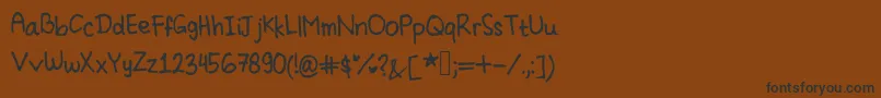 Шрифт Cindyyo s Handwriting – чёрные шрифты на коричневом фоне