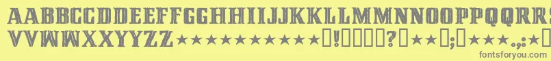 フォントCINQMM   – 黄色の背景に灰色の文字