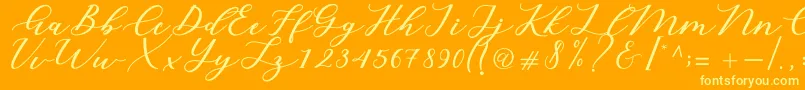 Cintya Script Font – Yellow Fonts on Orange Background