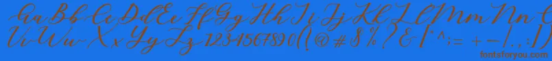 fuente Cintya Script – Fuentes Marrones Sobre Fondo Azul