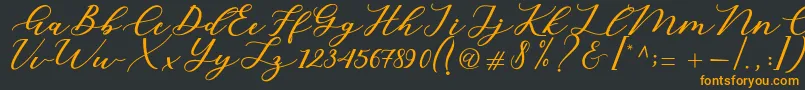 Cintya Script-fontti – oranssit fontit mustalla taustalla