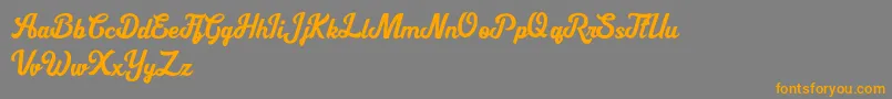 Cipthayasa DEMO-Schriftart – Orangefarbene Schriften auf grauem Hintergrund