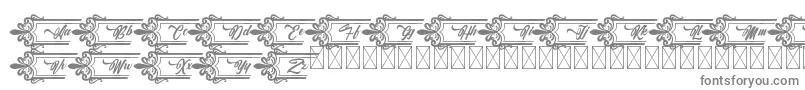 Clasicalderibbon-fontti – harmaat kirjasimet valkoisella taustalla