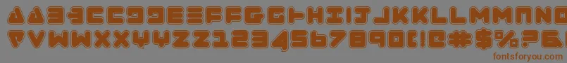 フォントZealotCollege – 茶色の文字が灰色の背景にあります。