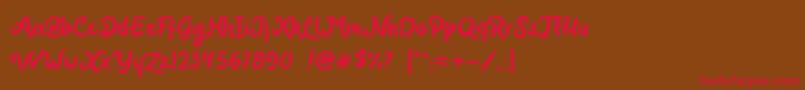 フォントClaytonia DEMO – 赤い文字が茶色の背景にあります。