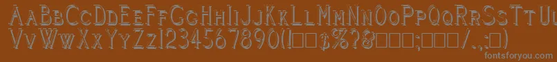 Cleavers Juvenia Shadowed-Schriftart – Graue Schriften auf braunem Hintergrund