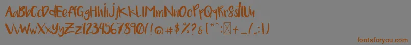 Cleganeフォントについての詳細 フォントClegane – 茶色の文字が灰色の背景にあります。